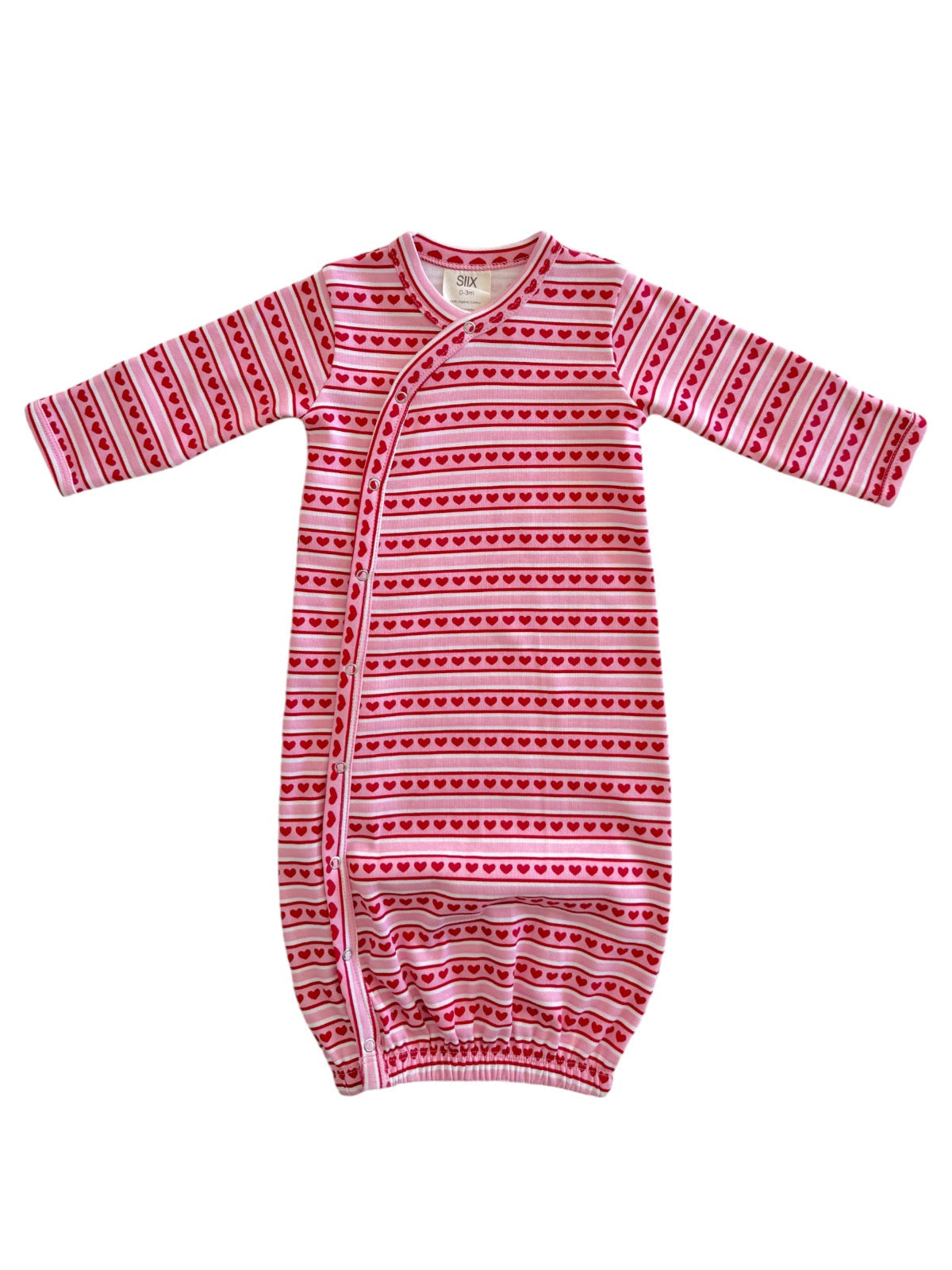 Pink striped baby sleep sack with heart patterns and long sleeves. Ideal for comfort and warmth.