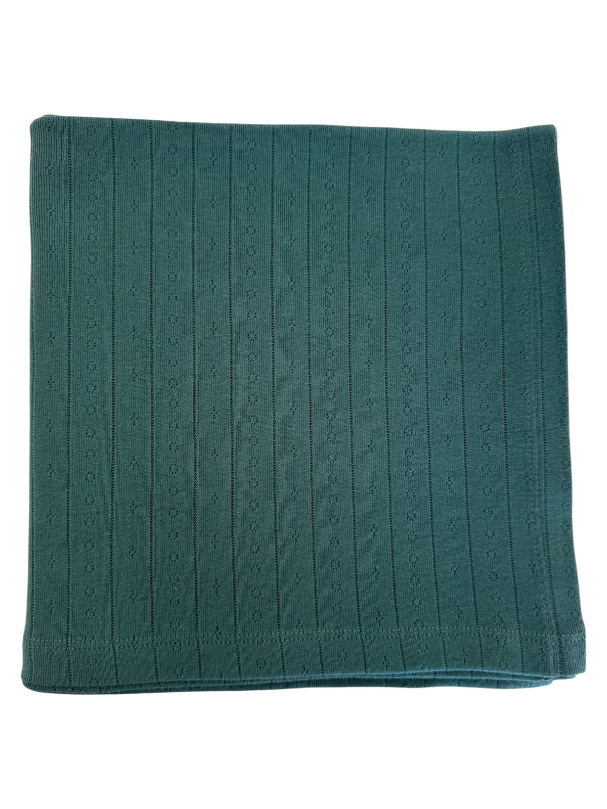 Folded green blanket with a textured, ribbed pattern. Ideal for cozying up or home decor.