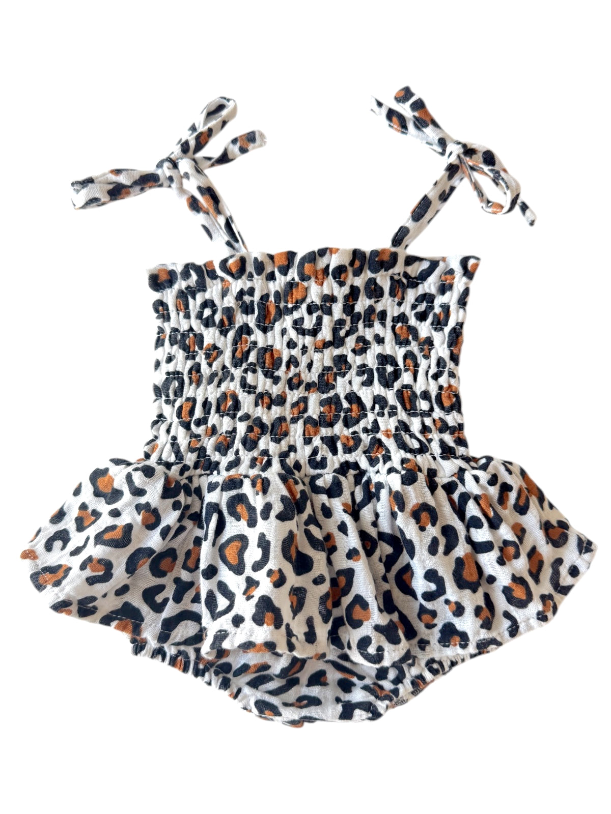 Leopard print romper with adjustable straps and a ruffled skirt. Perfect for summer outfits for kids.