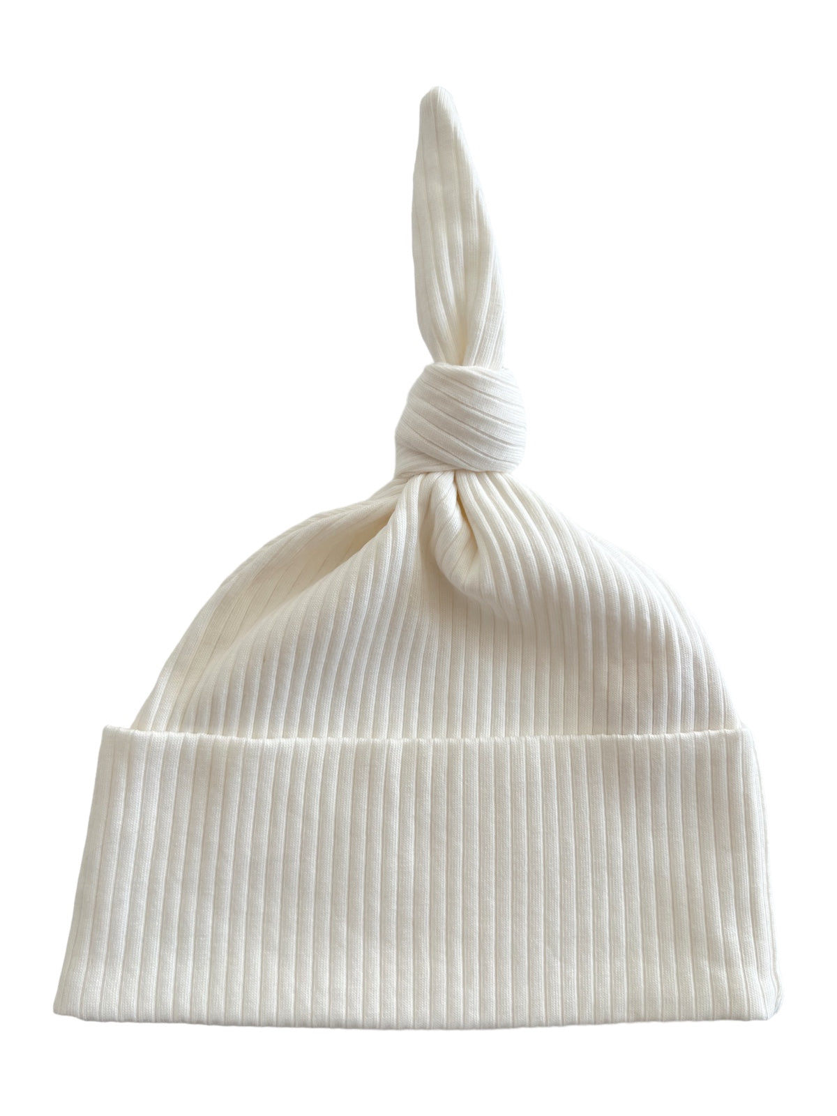 White ribbed knit beanie hat with a knot at the top.