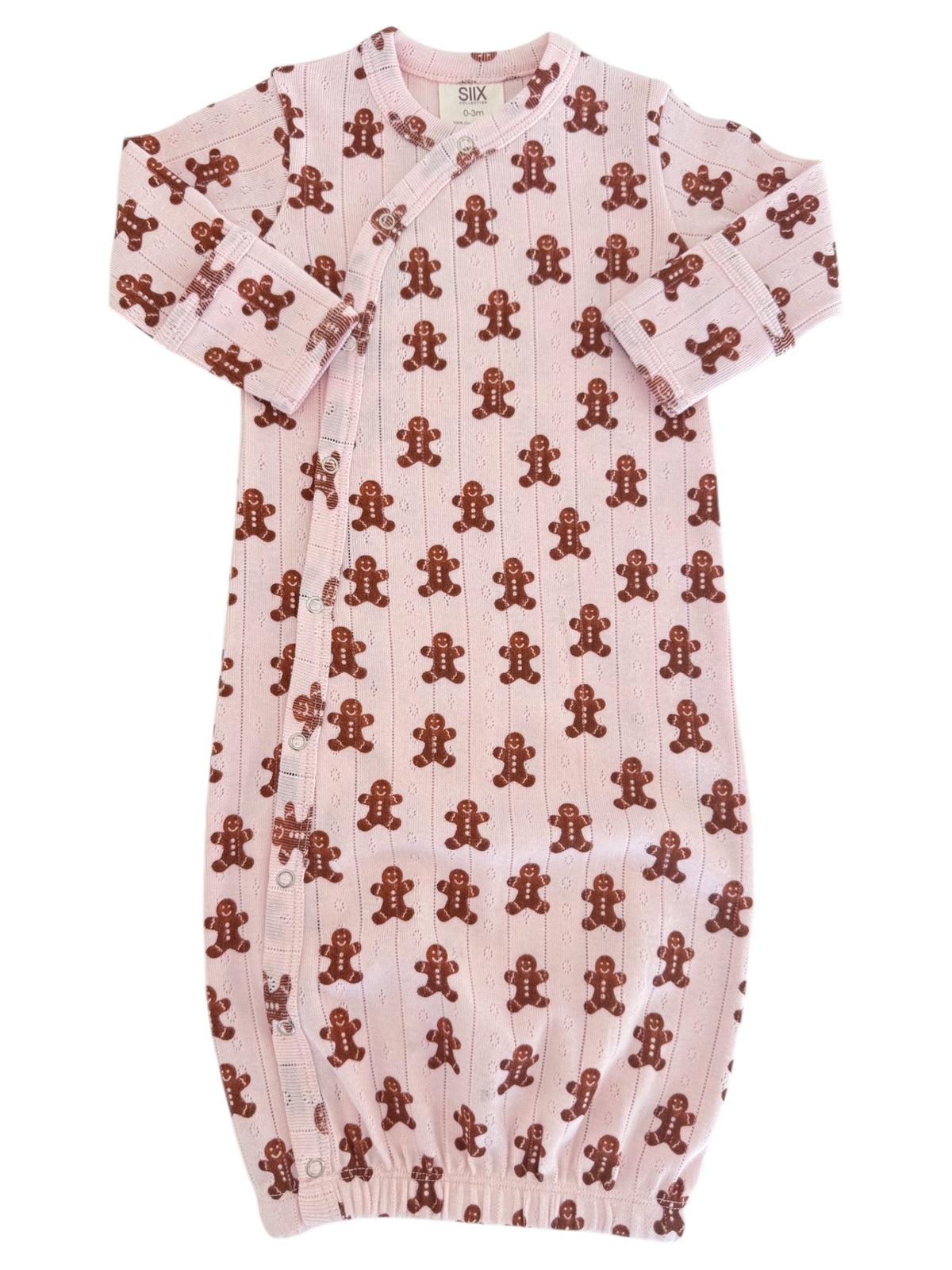 Pink baby gown with brown gingerbread man patterns, featuring snap buttons and long sleeves.