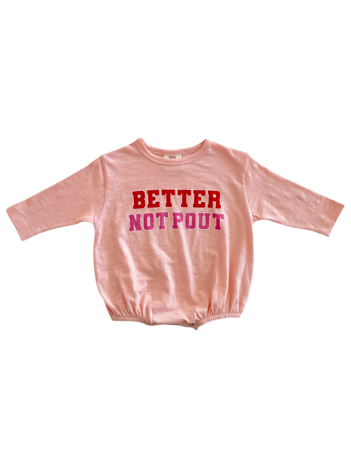 Pink long-sleeve shirt with the text