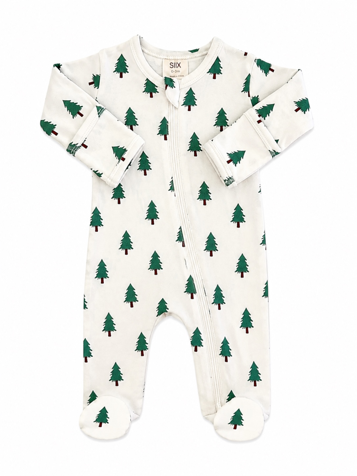 White baby onesie with green Christmas tree print and footed bottoms, featuring a front zipper closure.
