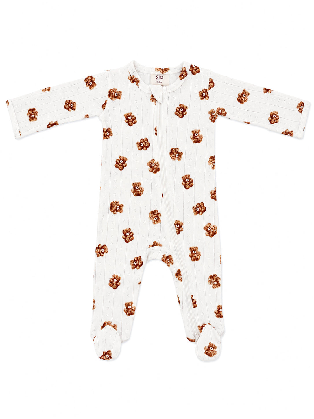 White baby sleeper with brown teddy bear print, featuring full sleeves and footed design.