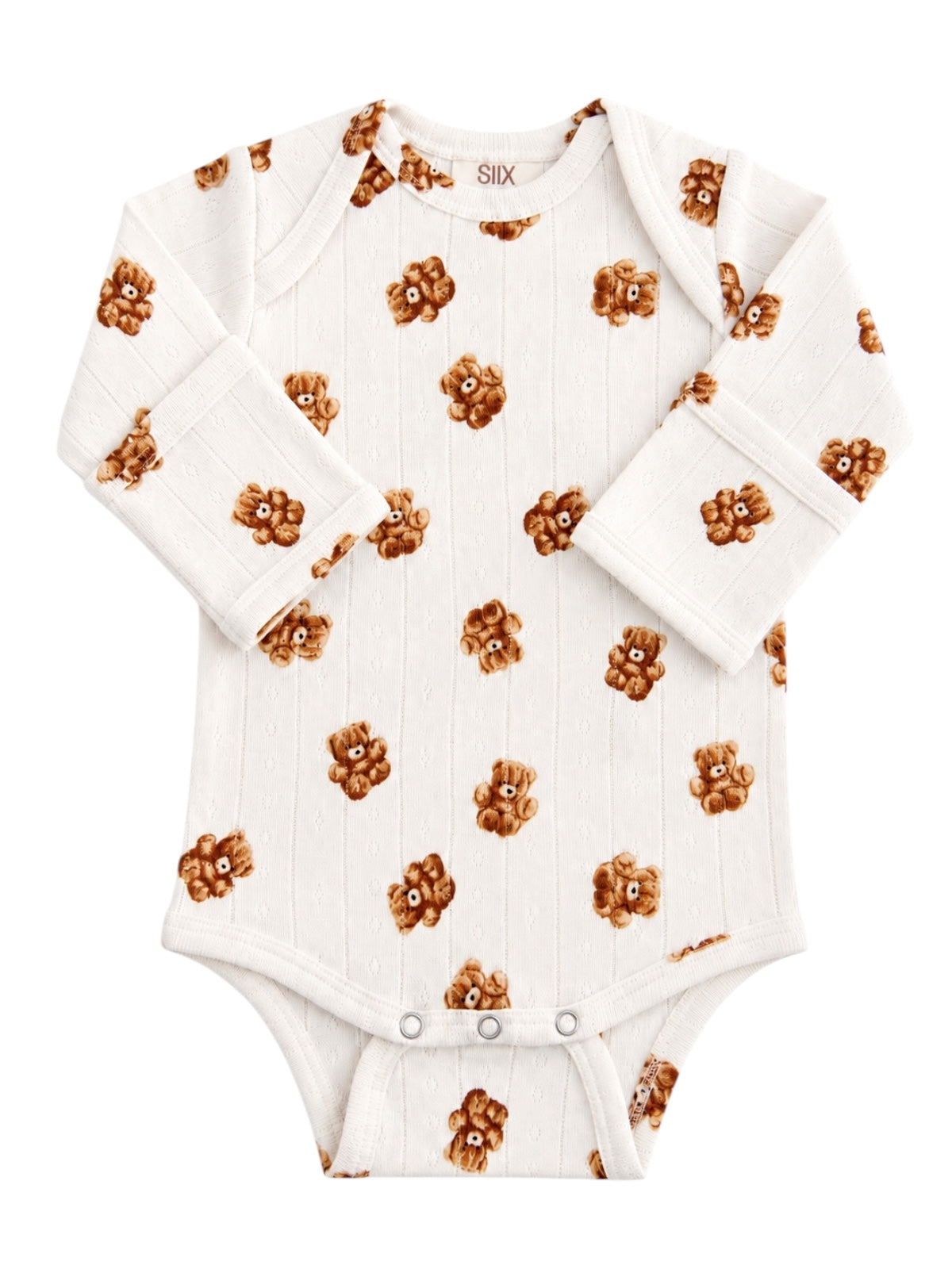 White baby onesie with teddy bear pattern on a textured background. Ideal for infants, cozy and stylish.