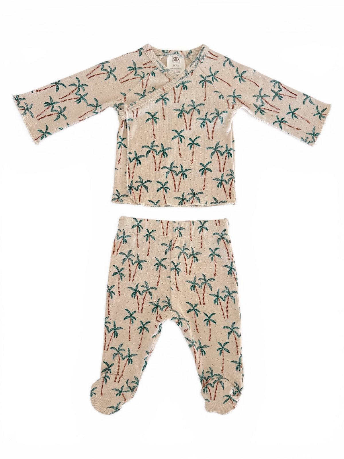 Beige baby outfit featuring palm tree print, including a long-sleeve top and footed pants.