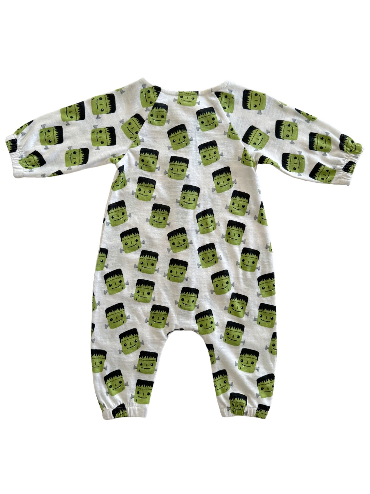 Green Frankenstein-themed baby onesie with long sleeves and playful faces pattern.