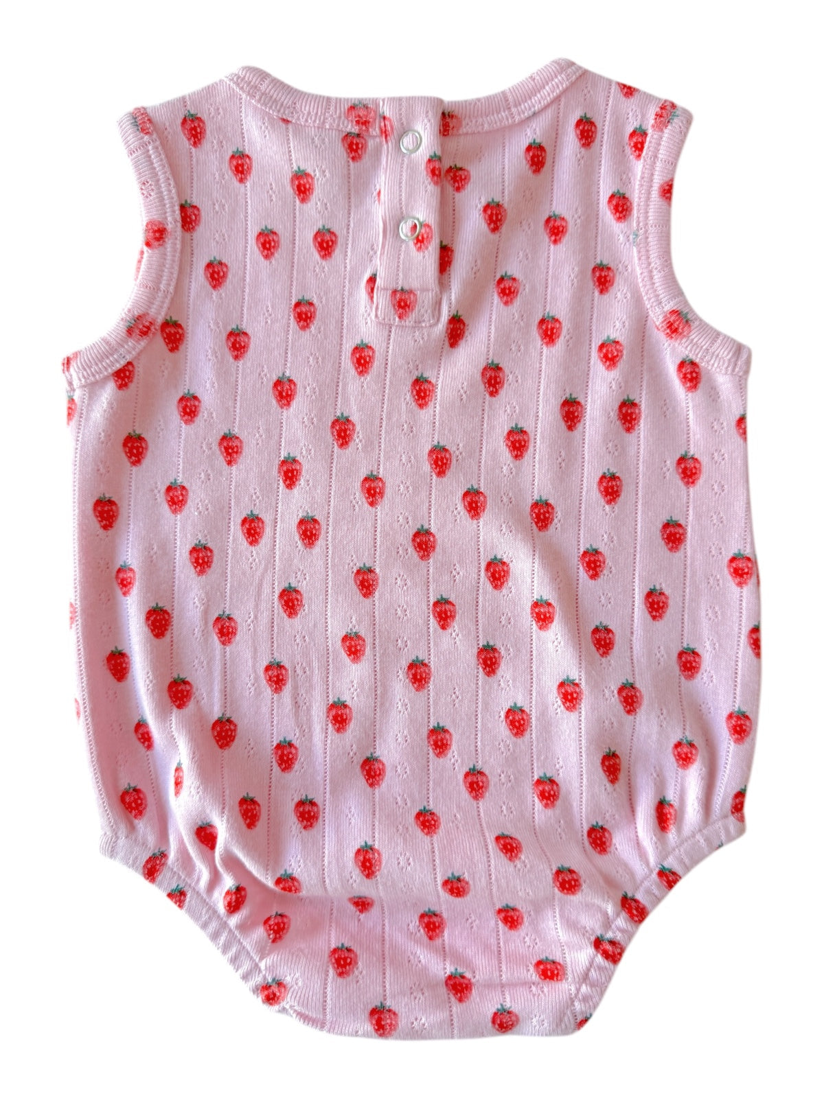 Pink baby onesie with a strawberry pattern and button closure at the back. Ideal for warm weather.