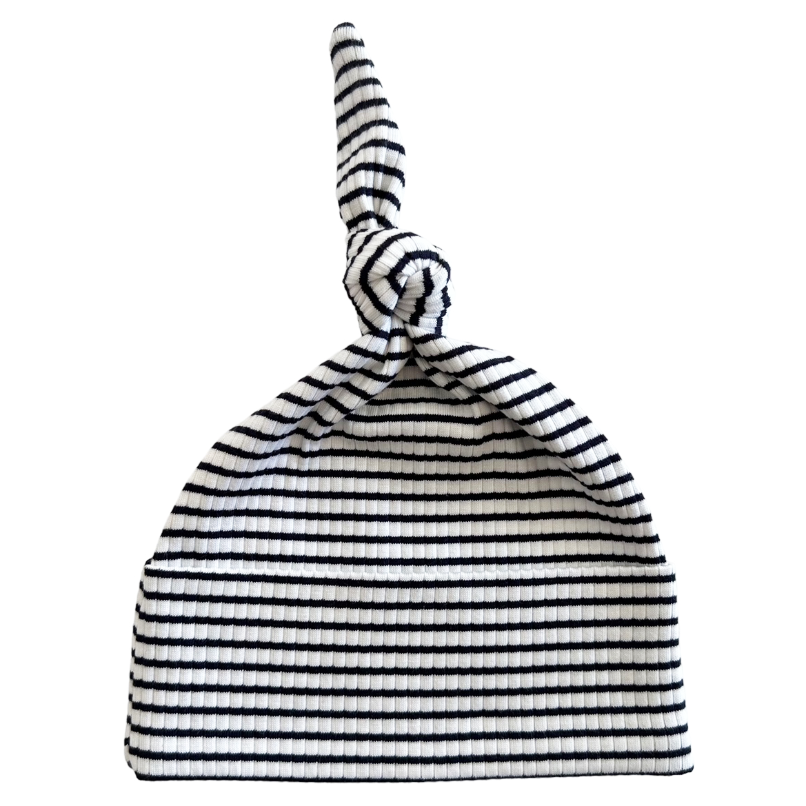 Striped baby hat with a knotted top, featuring black and white horizontal stripes.