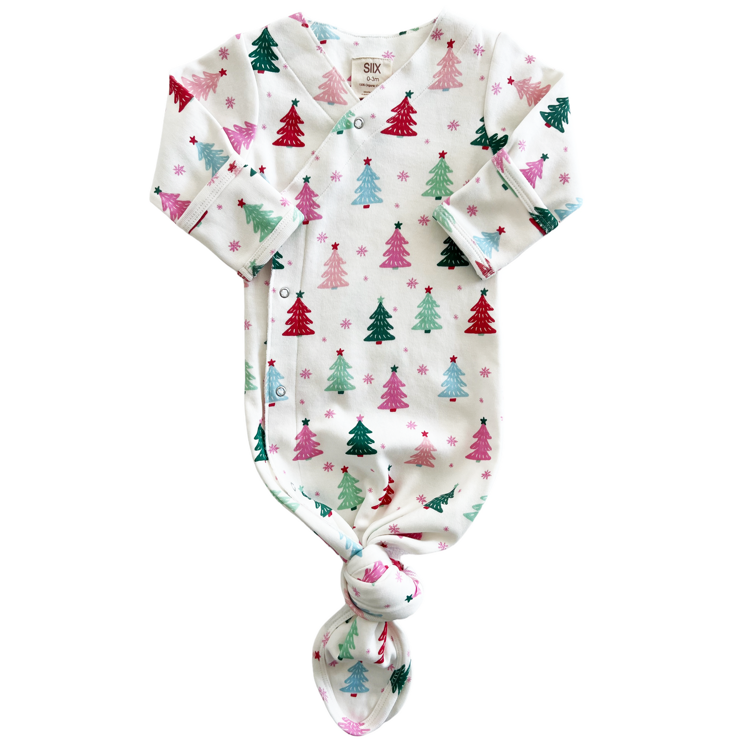 White baby outfit with colorful Christmas tree patterns, featuring a knot at the bottom and long sleeves.