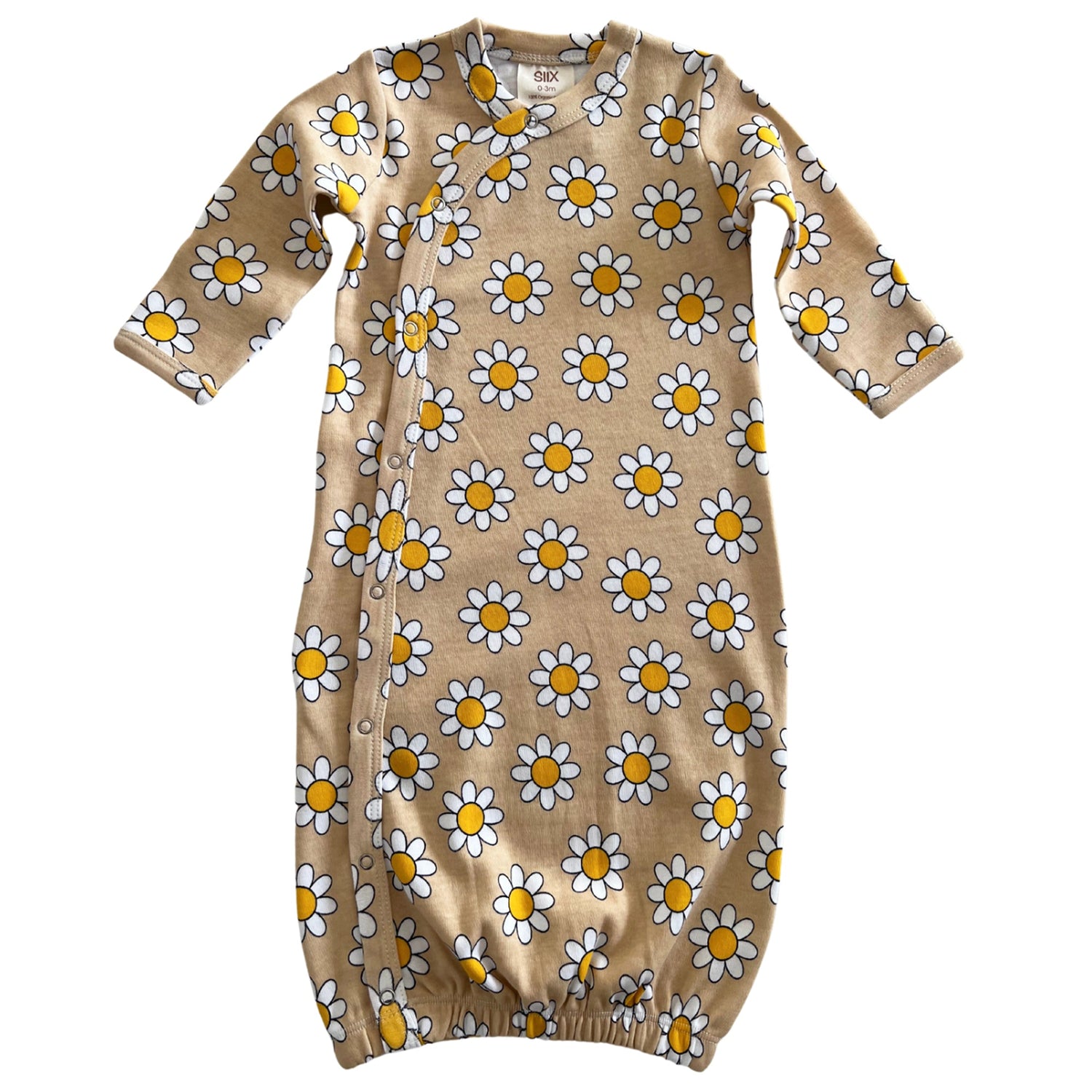 Tan baby gown with yellow and white daisy print and snap closures along the side. Ideal for comfortable wear.
