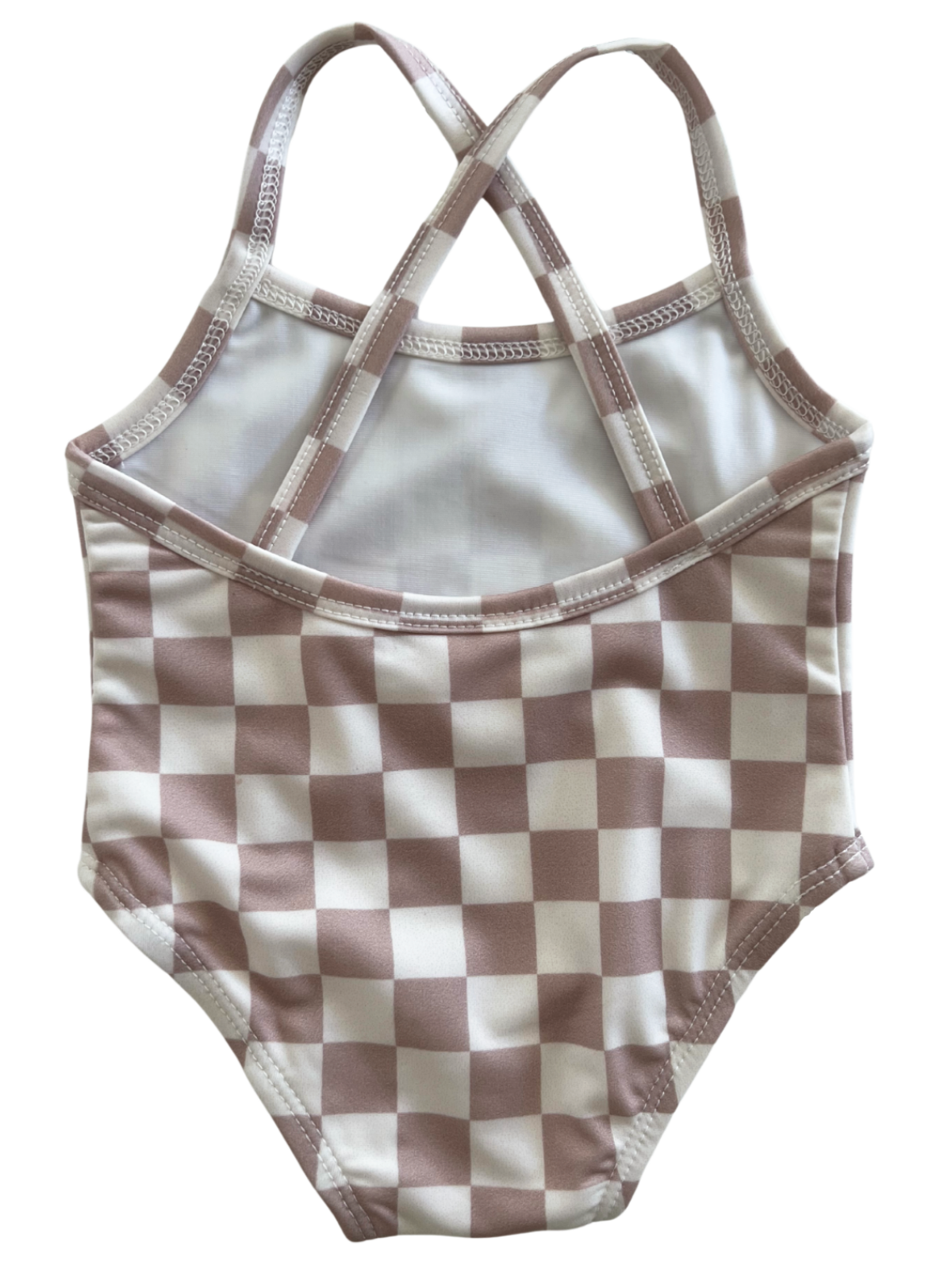 Girls' checked swimsuit in soft pink and white, featuring crossed straps at the back.