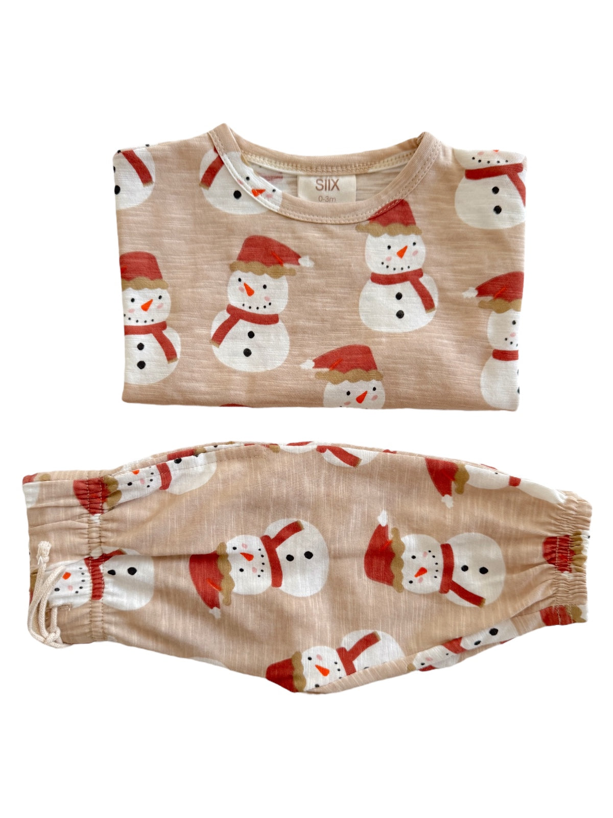 Tan pajama set featuring cheerful snowman print with red hats and scarves. Ideal for winter comfort and festivities.
