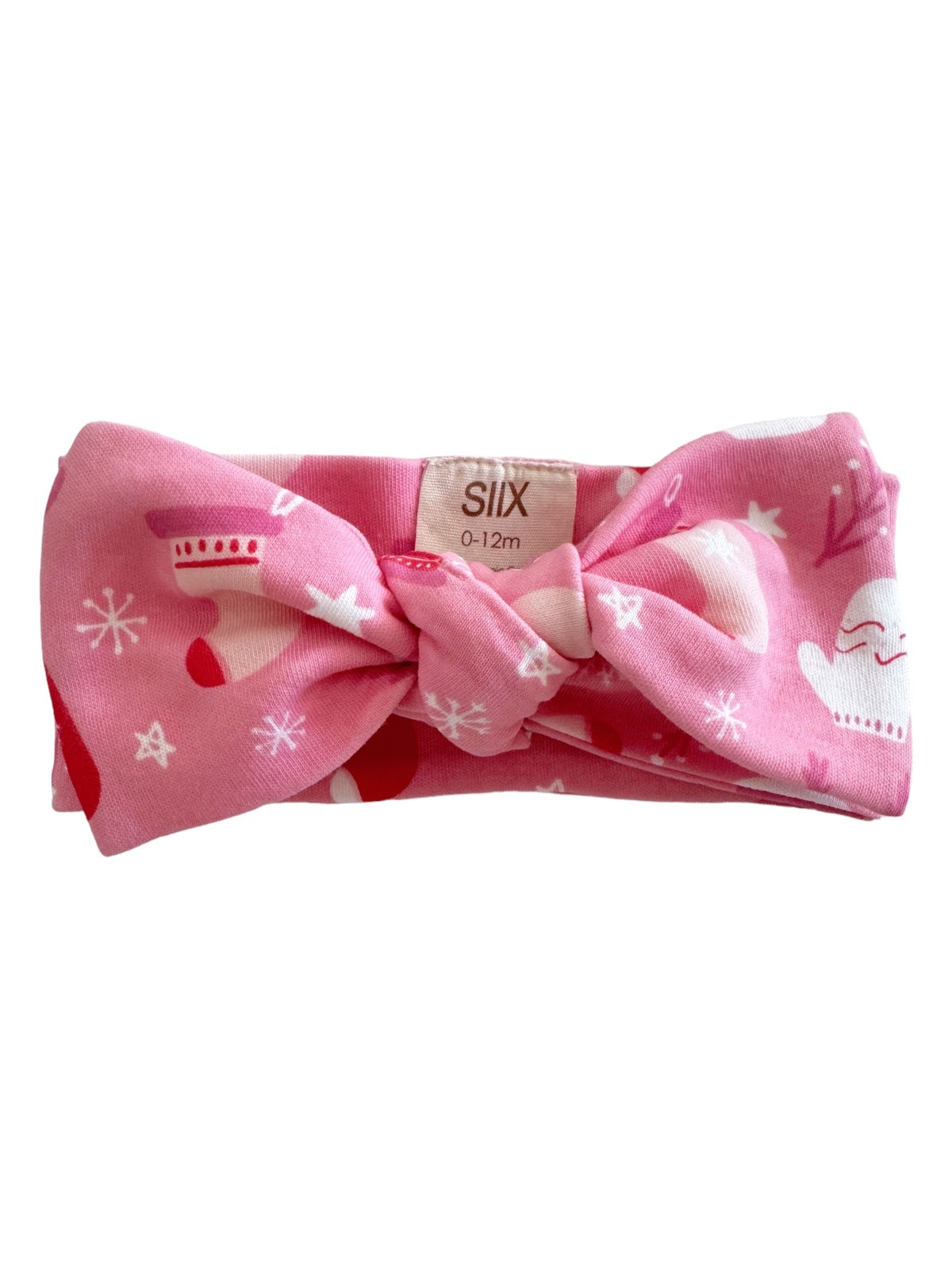Pink baby headband with a bow, featuring winter-themed prints like mittens and snowflakes. Suitable for 0-12 months.