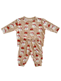 Beige children's outfit with snowman print, featuring a long-sleeve top and elastic waist pants.