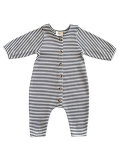 Striped baby jumpsuit with long sleeves and button closure, featuring black and white horizontal stripes.