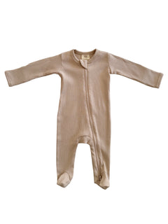Beige ribbed baby onesie with long sleeves and a front zipper, designed for comfort and ease.