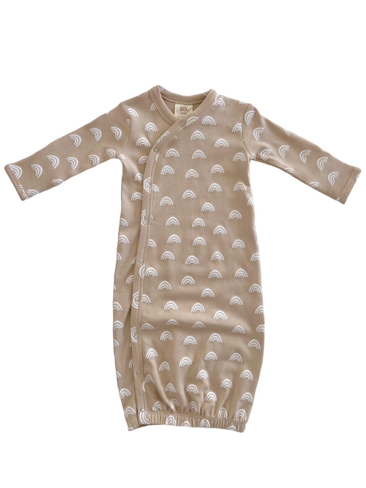 Beige baby gown with white rainbow patterns and long sleeves, featuring snap closures for easy dressing.