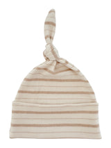 Cream and beige striped baby hat with a knot on top, made from soft fabric.