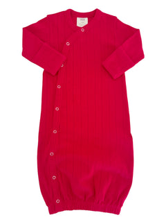 Bright pink baby sleeping gown with long sleeves and snap closures. Ideal for comfort and warmth during sleep.