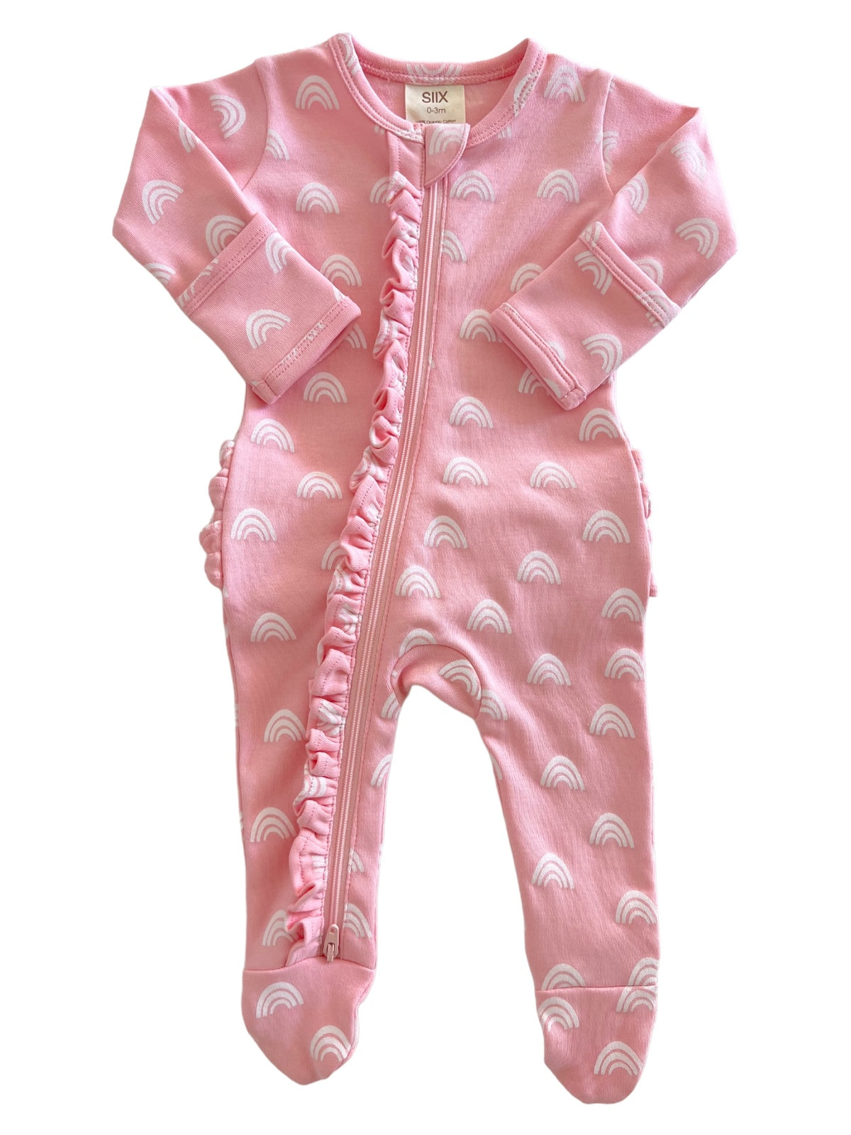 Pink baby onesie with white rainbow patterns and frill details along the zipper. Ideal for infants 0-3 months.