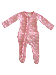 Pink baby onesie with rainbow patterns and ruffled zipper detail, designed for comfort and style.
