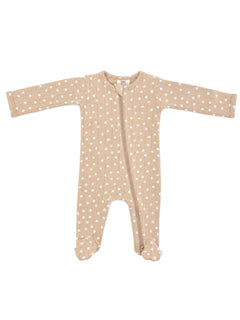 Tan baby onesie with white floral pattern, featuring long sleeves and a front zipper closure.