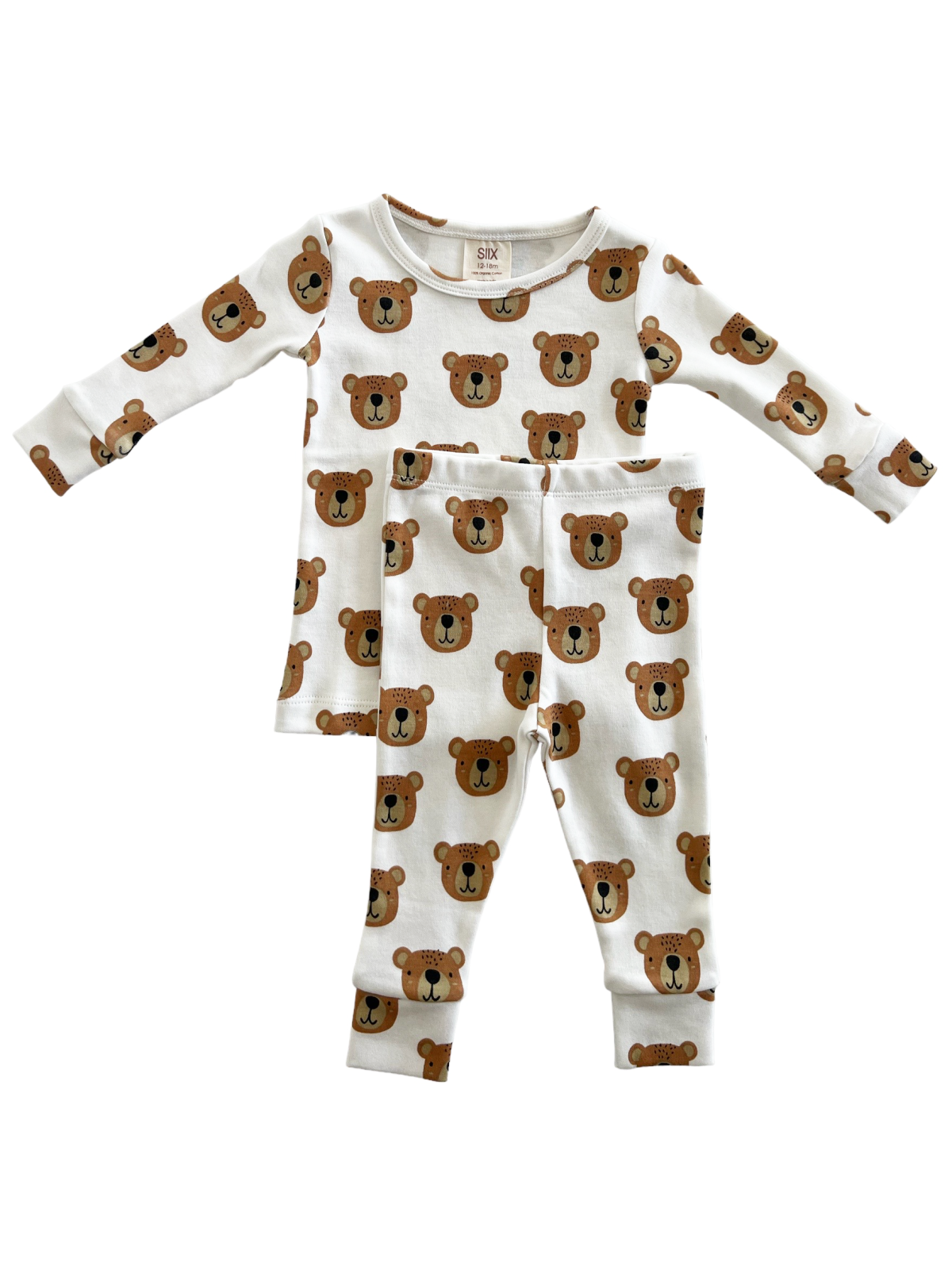 Children's pajamas featuring a playful bear pattern on a white background. Set includes a long-sleeve top and pants.
