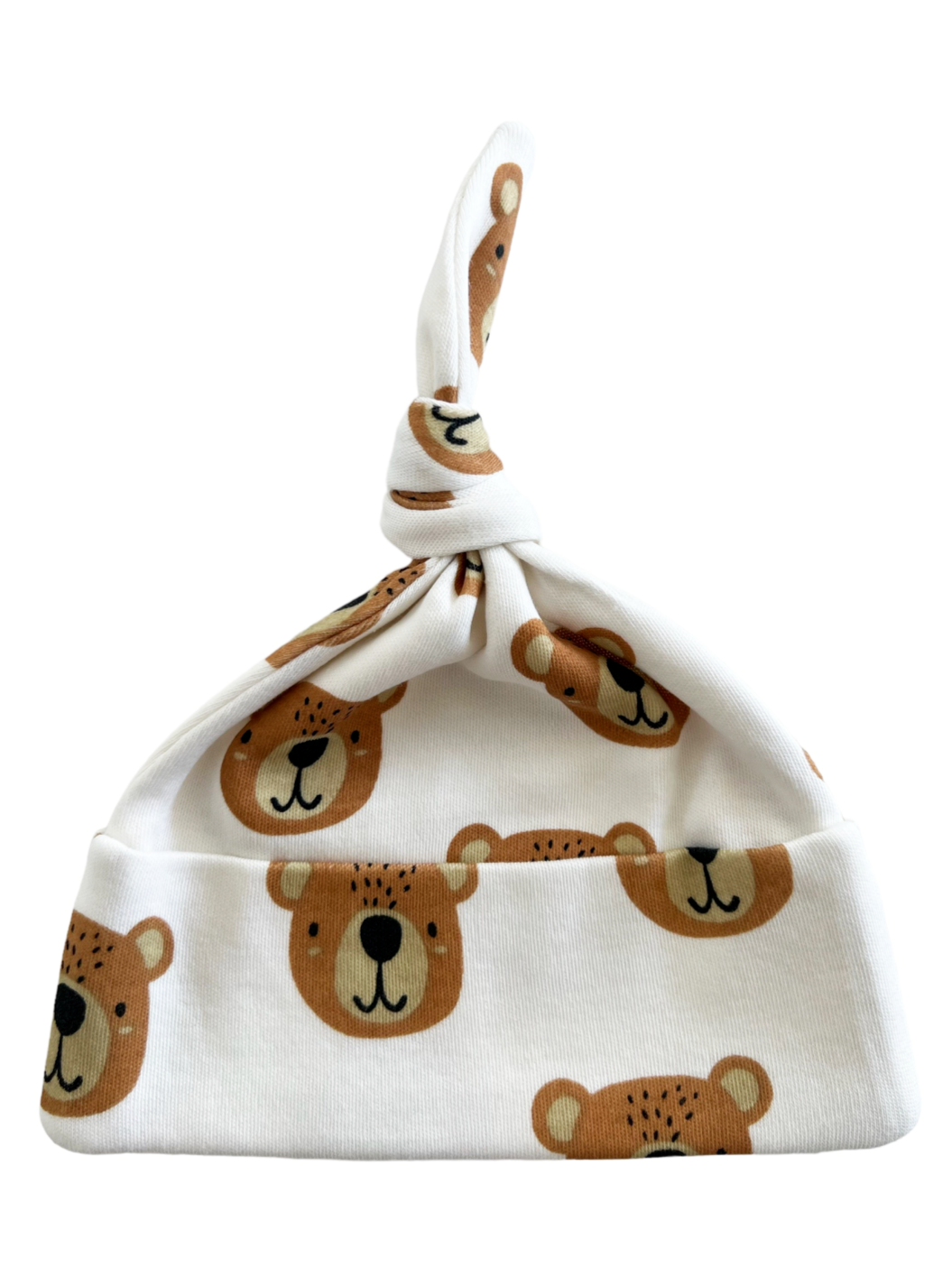 White baby hat with bear face prints and a knotted top.