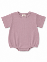 Light purple ribbed baby onesie with short sleeves and snap buttons at the bottom. Soft, comfortable fabric.