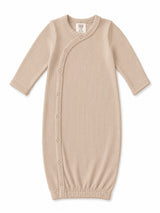 Beige ribbed baby gown with long sleeves and snap buttons, designed for newborns up to 3 months.