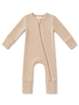 Beige ribbed baby onesie with a front zipper and long sleeves, ideal for comfort and easy dressing.