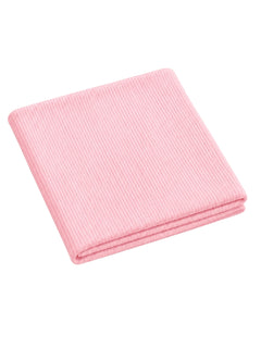 Pink ribbed fabric folded neatly on a white background. Ideal for various crafting projects or home decor.