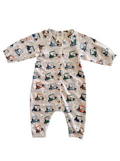 Beige onesie featuring colorful golf cart patterns and button closure, perfect for toddlers.