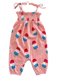 Pink romper with popsicle print and tie straps, perfect for summer wear.