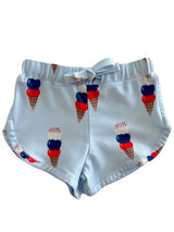 Light blue shorts featuring a playful ice cream cone print in red, white, and blue.