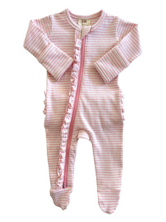 Pink checkered baby onesie with ruffled sides and a front zip closure, suitable for newborns.