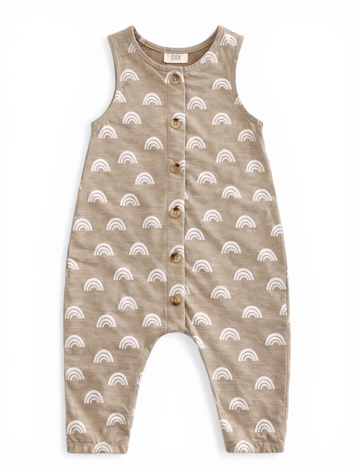 Tan romper with white rainbow patterns and wooden buttons, designed for infants.