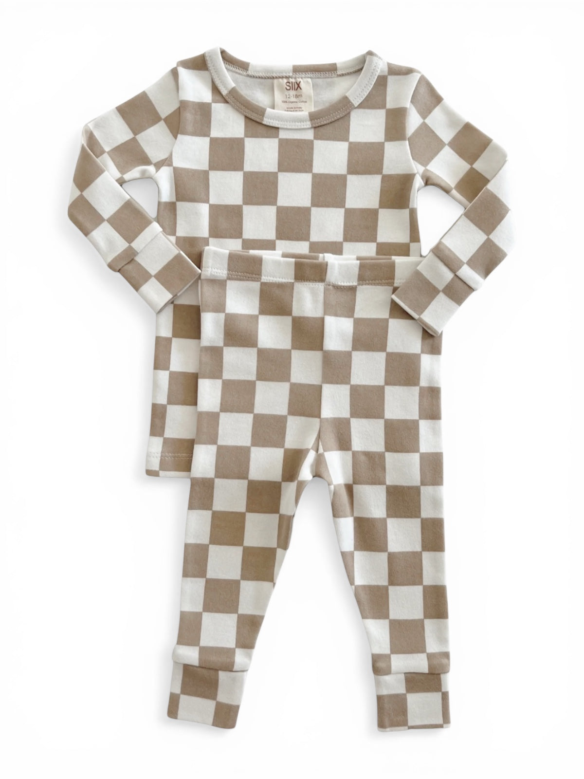 Tan and white checkered children's pajama set, featuring a long-sleeve top and matching pants.