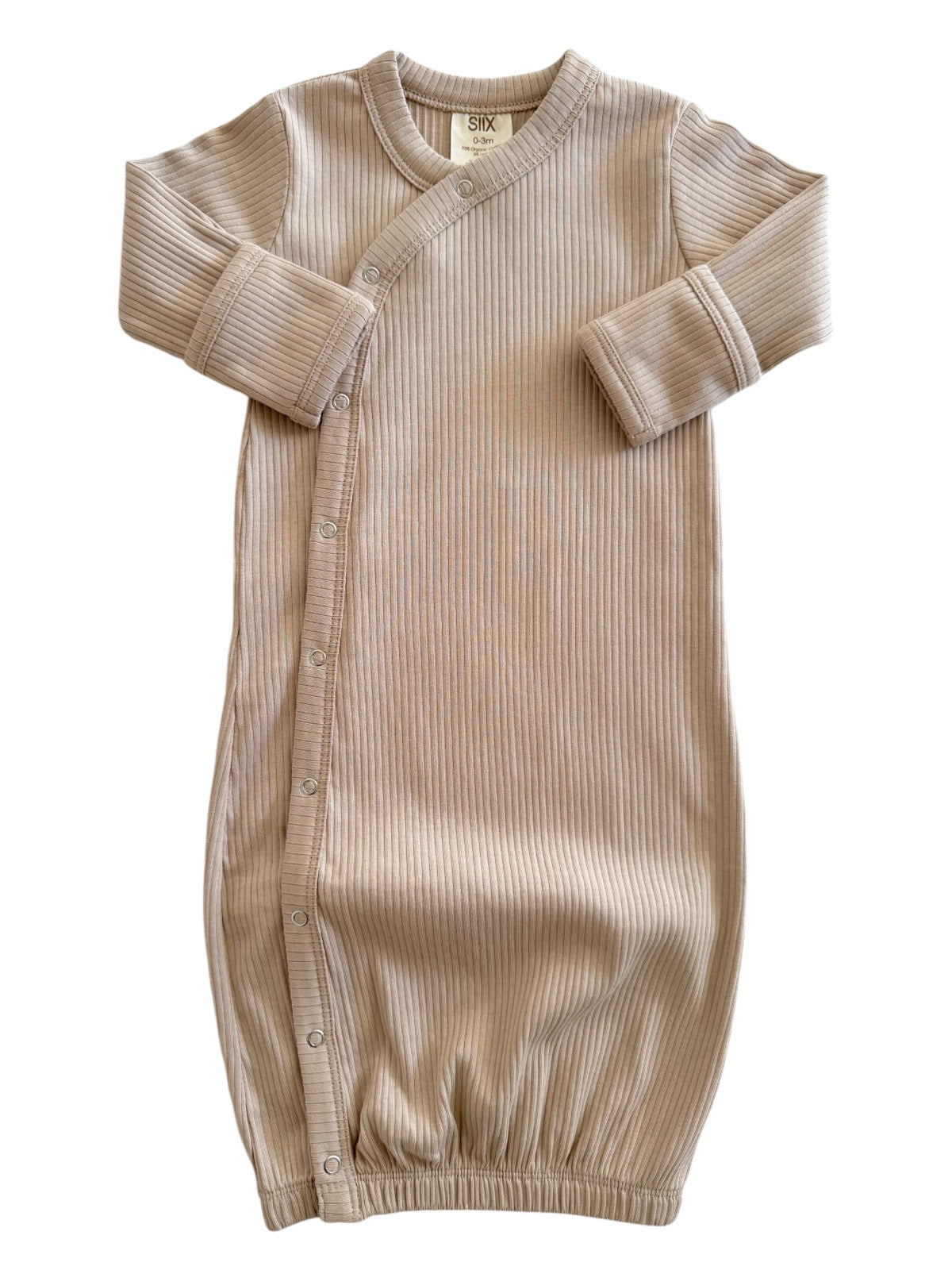 Beige ribbed baby gown with long sleeves and snap buttons, suitable for newborns.