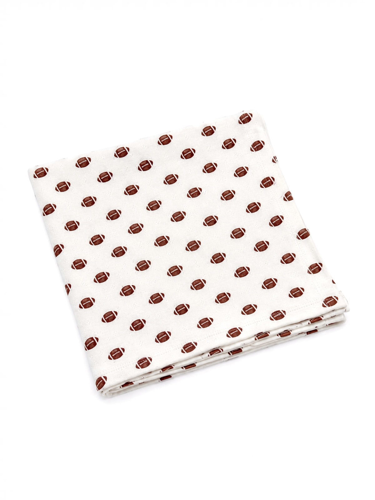 White cloth with a repeating pattern of brown footballs, folded neatly.