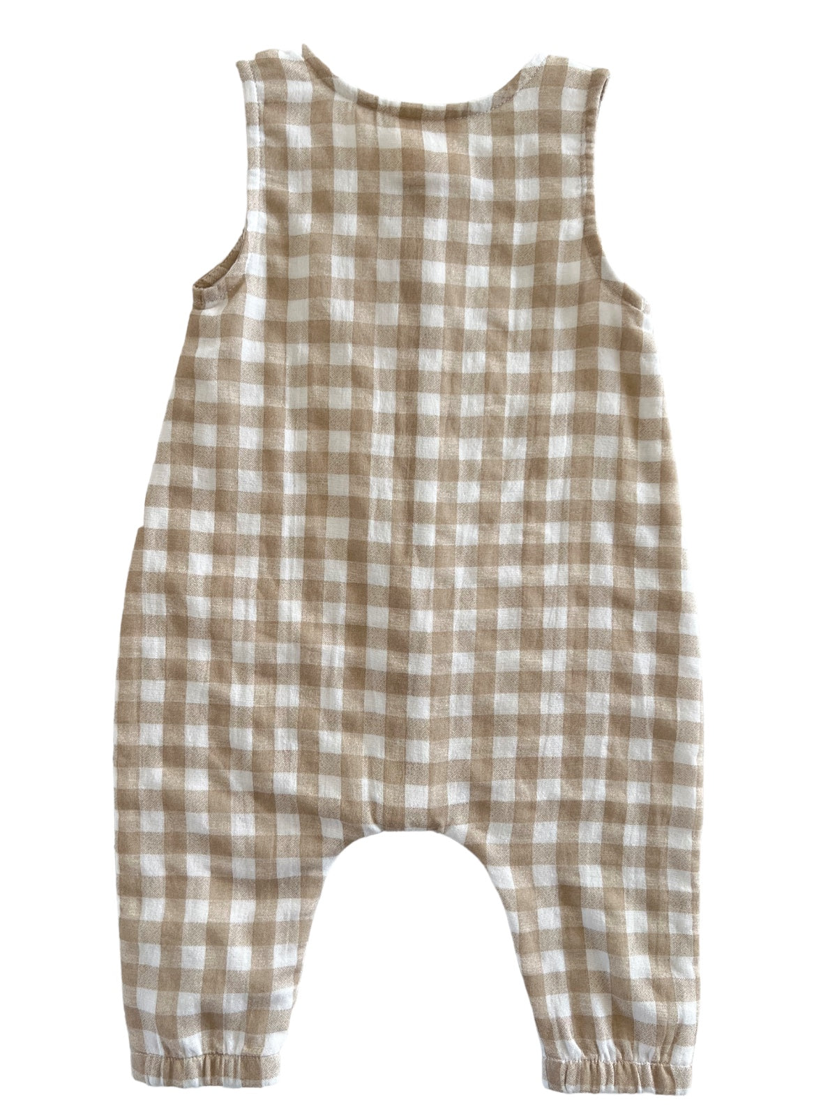 Light brown and white checkered toddler romper seen from the back, featuring loose-fitting legs and a sleeveless design.