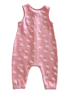 Pink toddler romper with a pattern of white rainbows. Ideal for playful and stylish outfits.