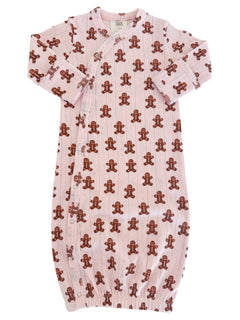 Pink baby gown with brown gingerbread man patterns, featuring snap buttons and long sleeves.