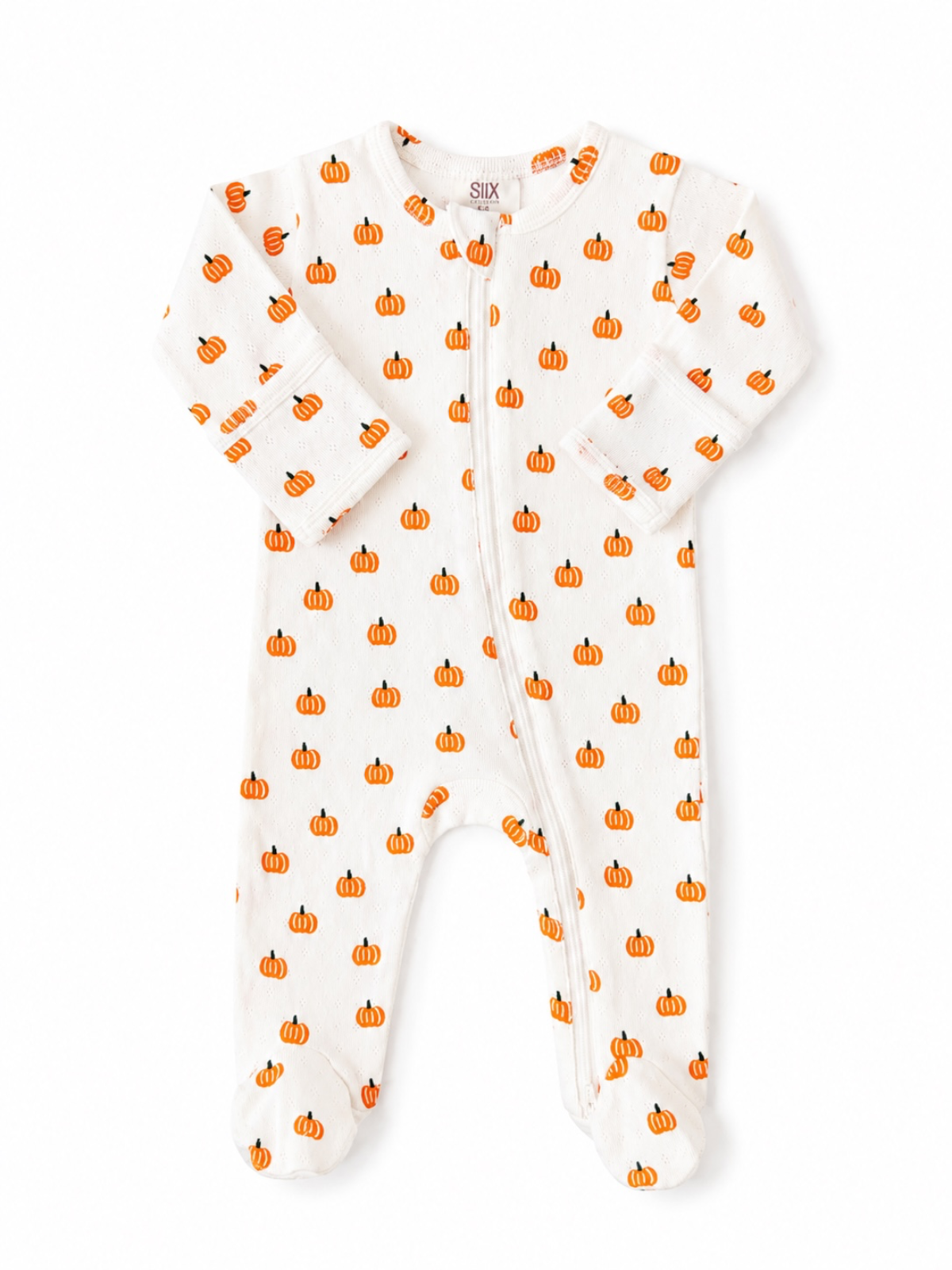 White baby onesie with orange pumpkin prints, featuring a zipper and long sleeves. Perfect for autumn or Halloween.