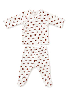 Baby outfit featuring a long-sleeve top and pants with a football pattern on a white background.