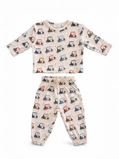 Kids' pajama set featuring a golf cart print, including a long-sleeve top and elastic waist pants.