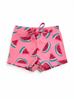 Pink swim shorts featuring a playful watermelon pattern with shades of green and black. Ideal for summer wear.