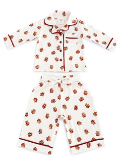 Kids' white pajama set with bear prints, featuring a button-up top and drawstring pants with red accents.
