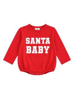Red baby onesie with "SANTA BABY" text in white, featuring long sleeves and snap closures at the bottom.